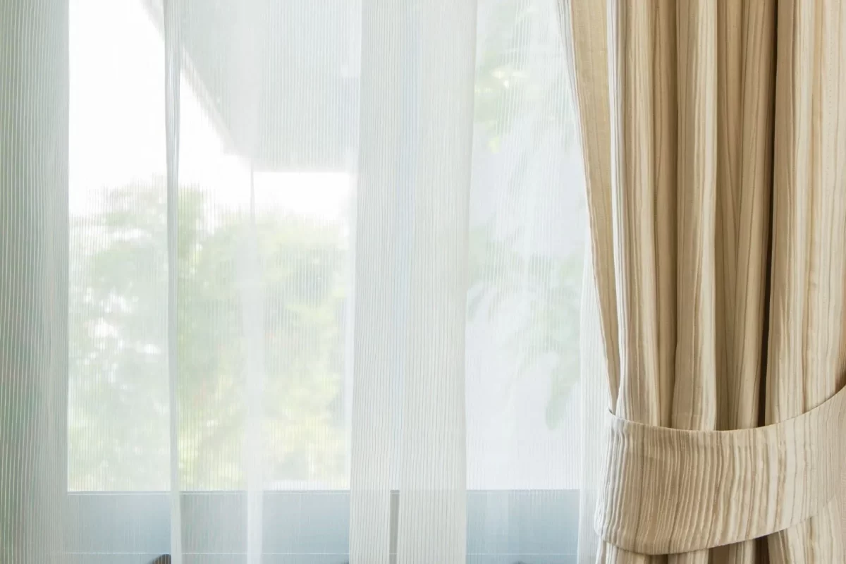 Curtain held with a fabric tie back