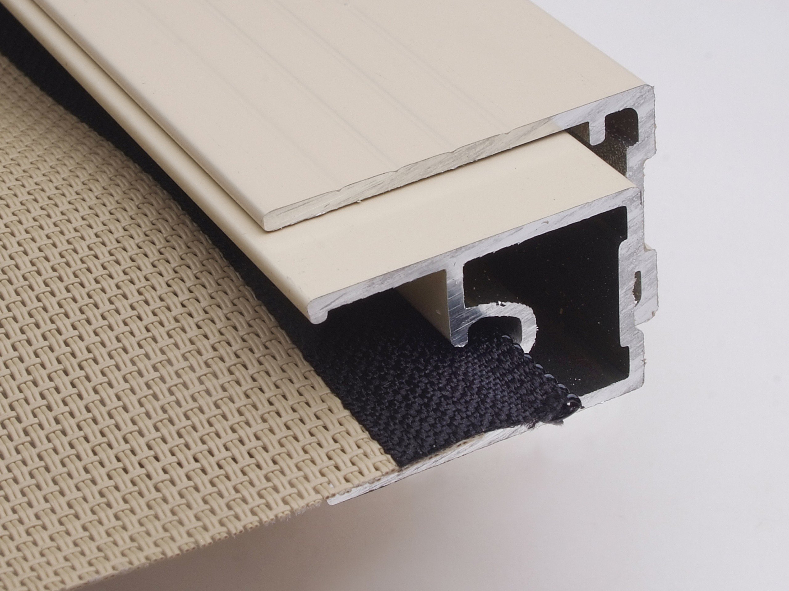 Zipscreen inner channel cutaway showing the fabric retention