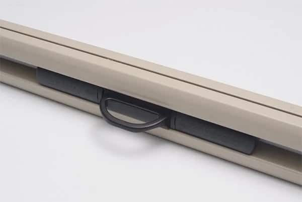 Ziptrak centre release lock