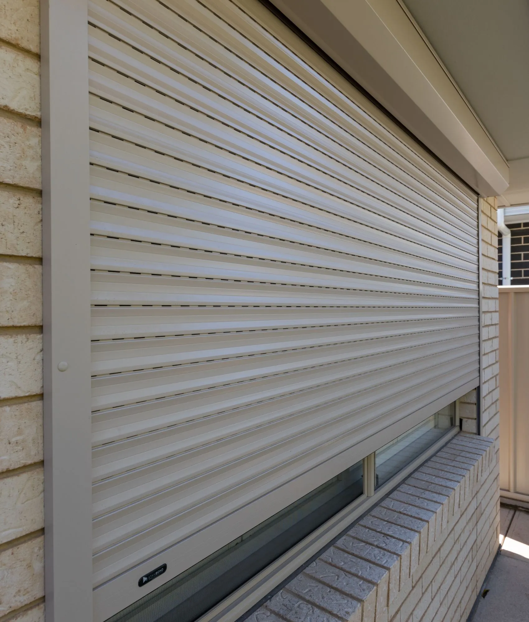 Roller shutters on a home exterior