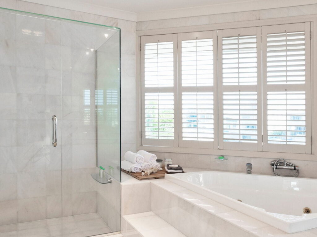 White plantation shutters in a bathroom