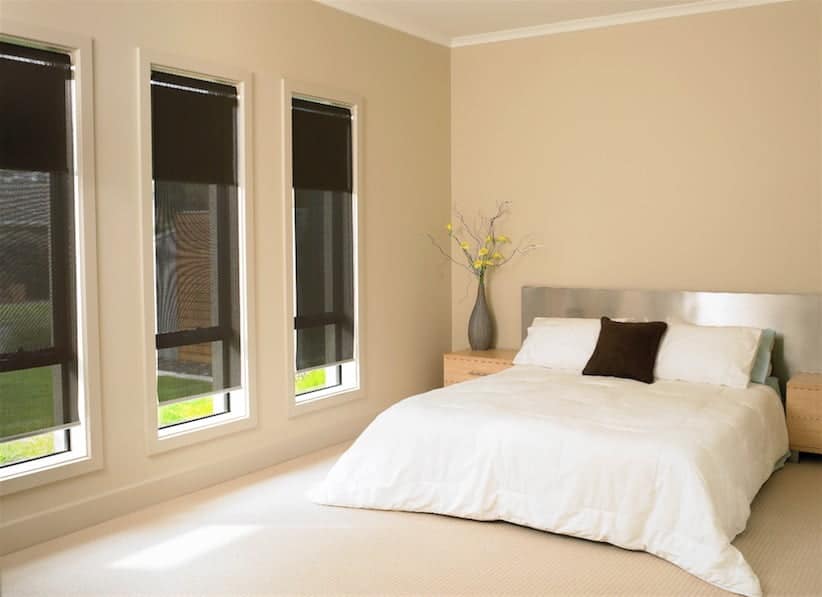 Blockout roller blinds fitted to bedroom windows