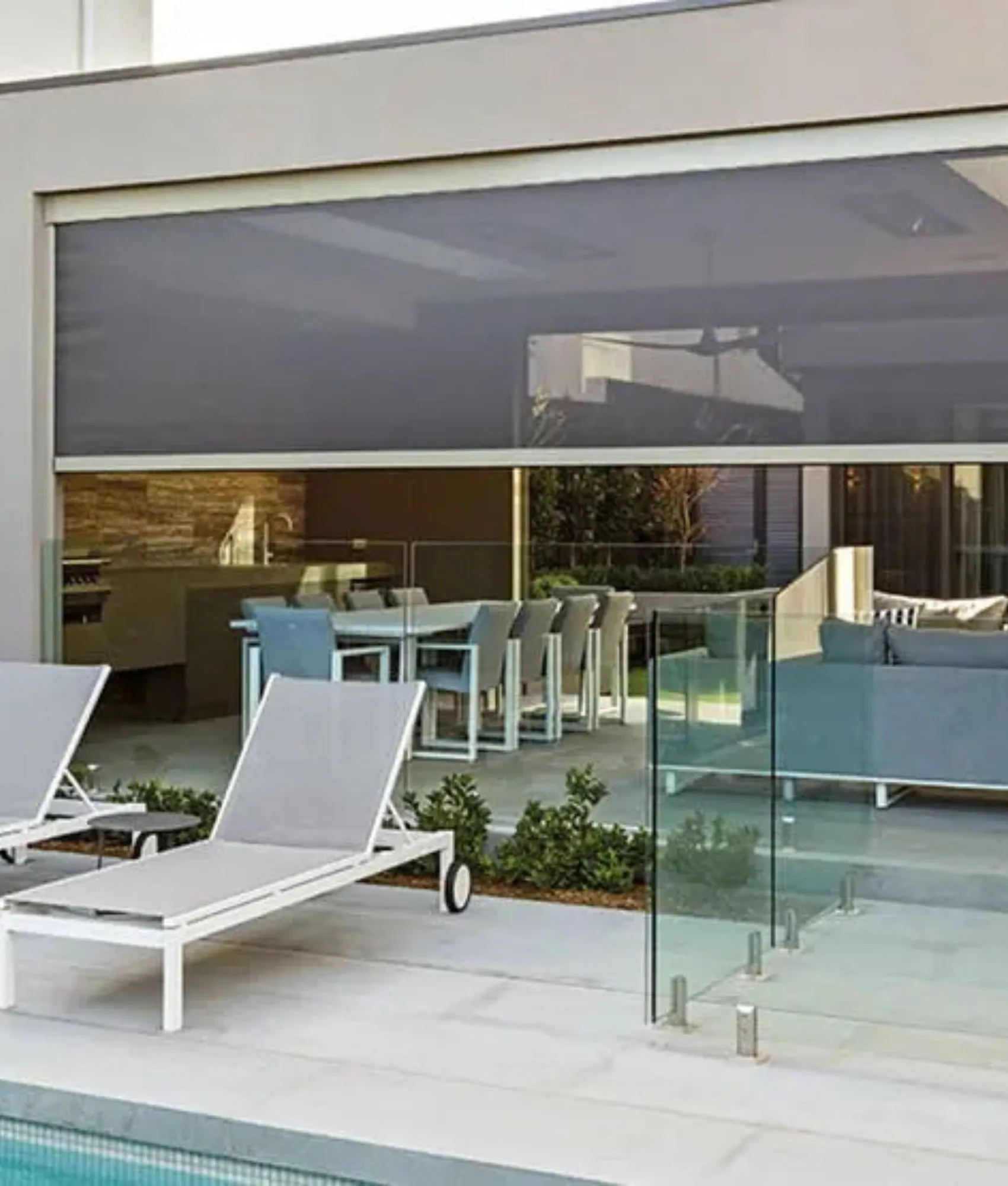 Zipscreen blinds around a poolside alfresco area