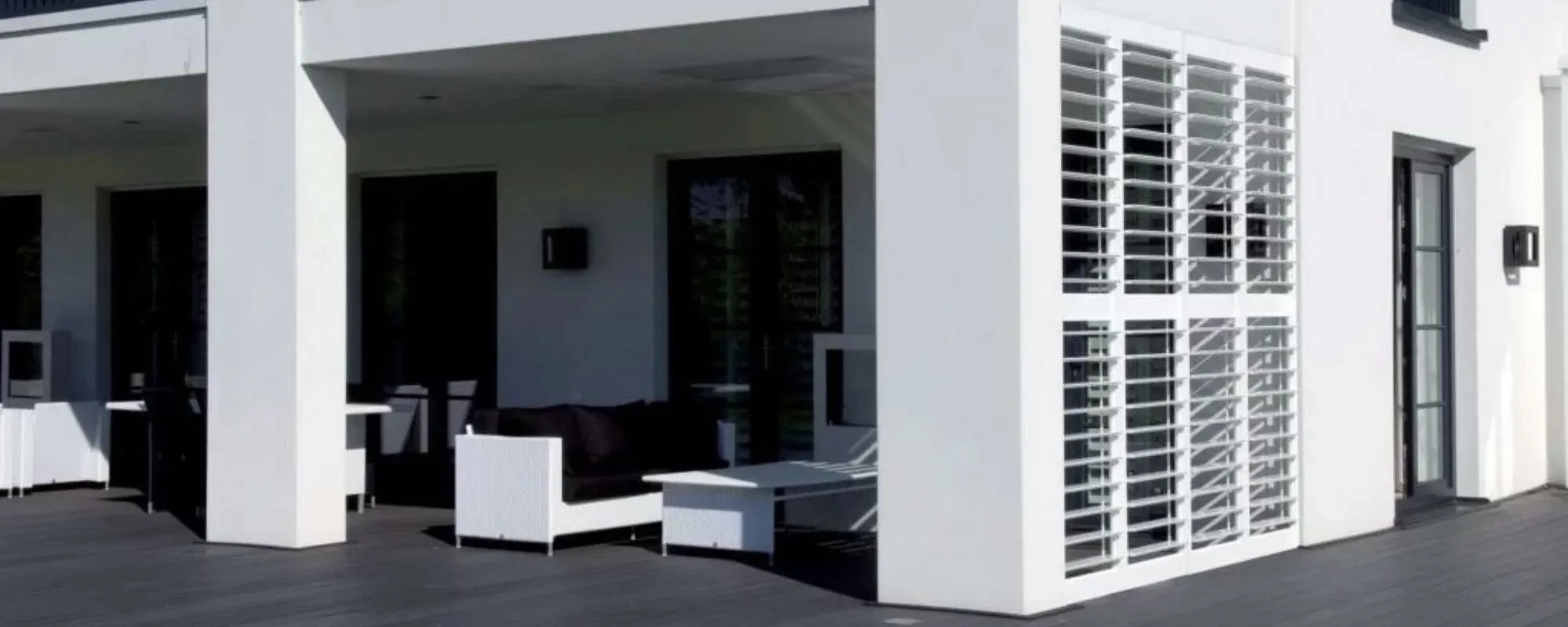Outdoor aluminium plantation shutters around an alfresco area